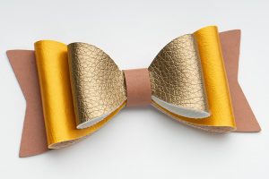 brown gold classic faux leather bow