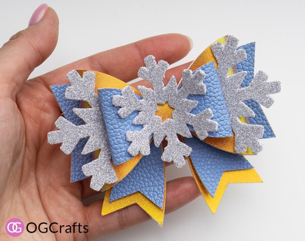 Faux leather snowflake bow blue and gold