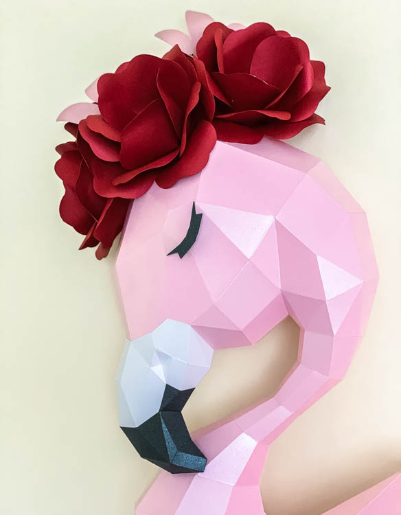 Paper craft flamingo with paper flowers